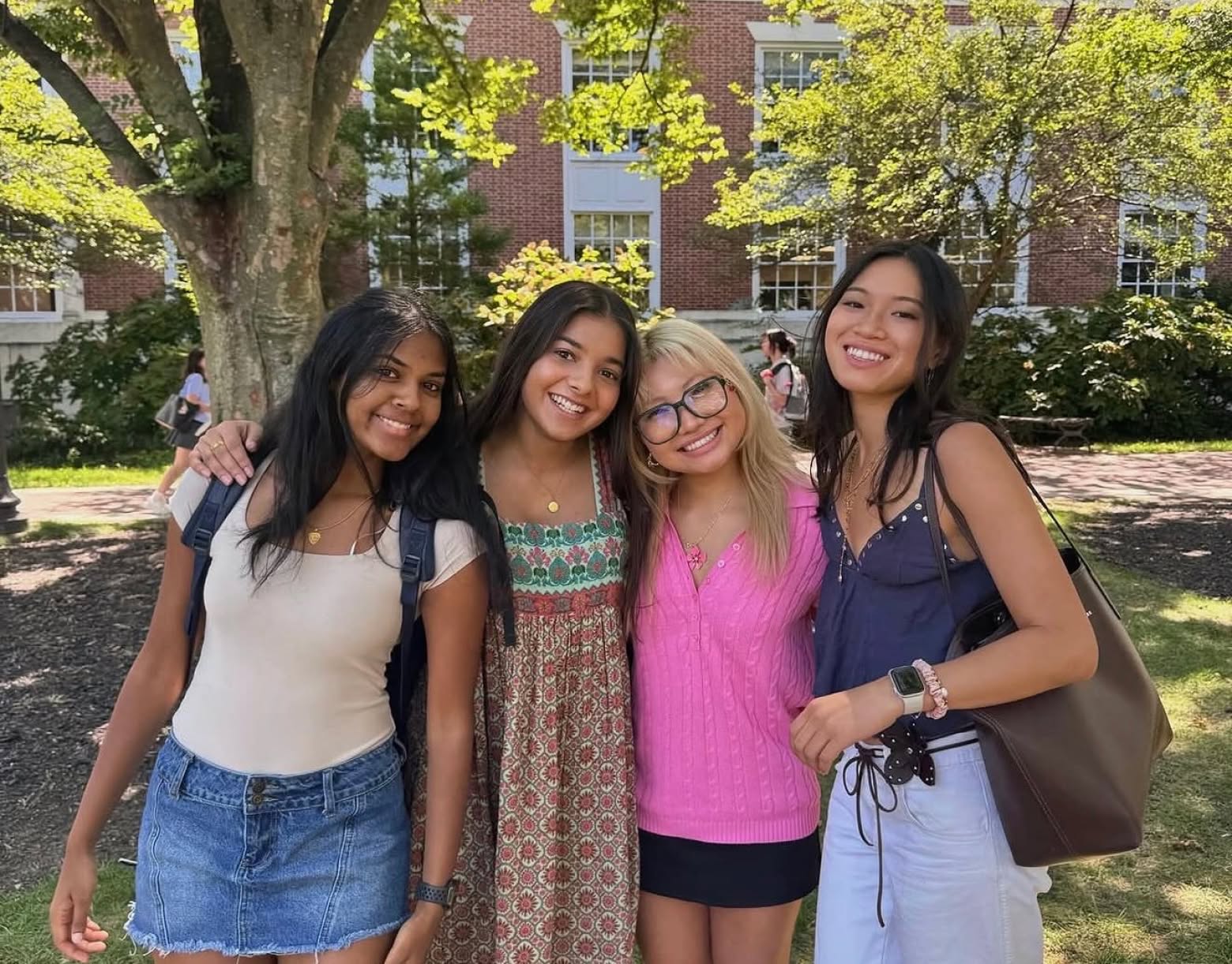 PMU sisters posing for a picture on campus between classes