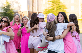 PMU sisters hugging