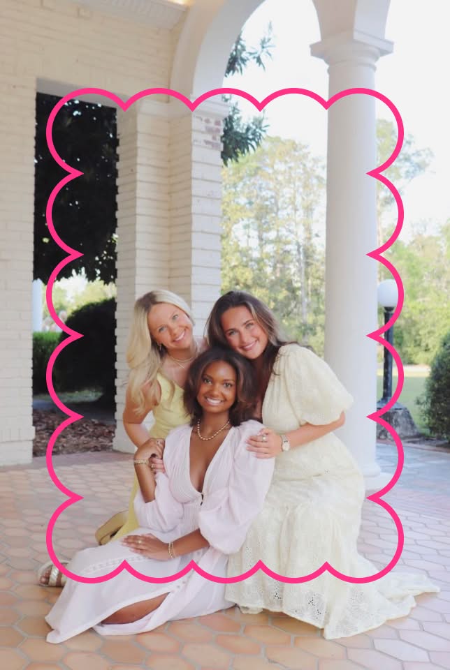 sisters sitting on porch of pmu house smiling for a photo
