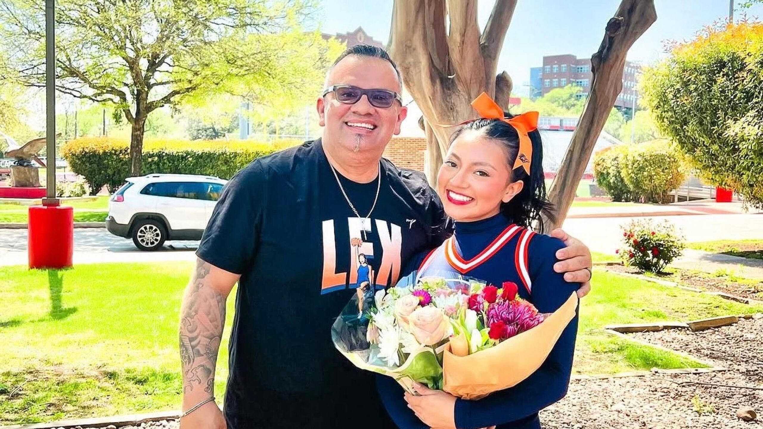 PMU sister standing with father outside