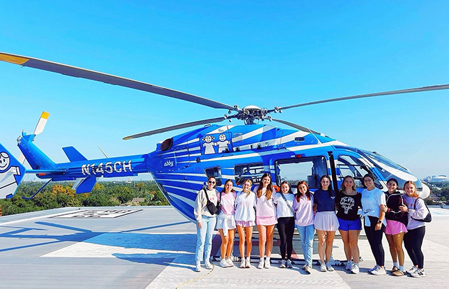 PMU sisters gathered together near Children's Miracle Network helicopter transportation