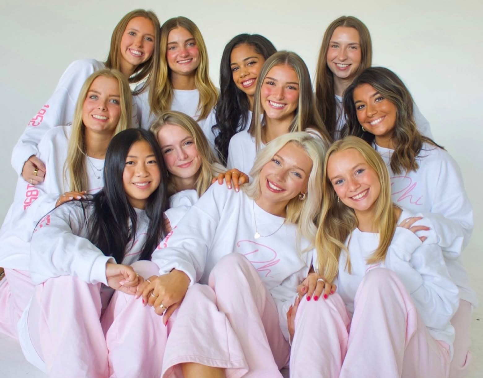 PMU-sisters-cheering-together-at-campus-event-membership-updates-banner@2x