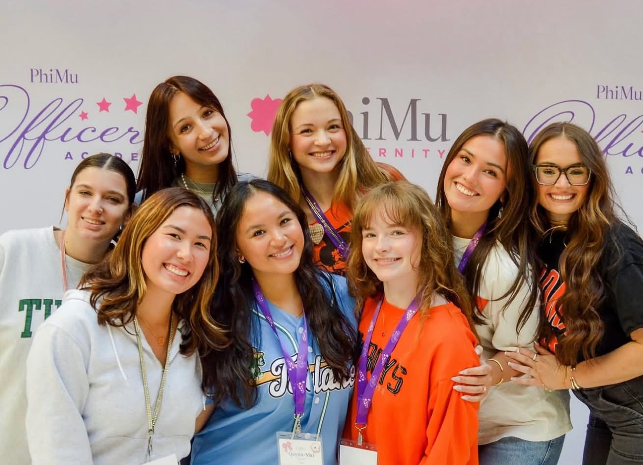 PMU-sisters-hugging-for-photo-at-event-helpful-links-for-collegians@2x