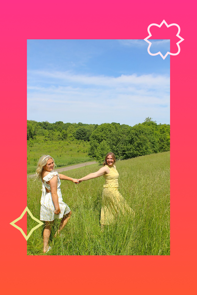 image of two girls running in a field within a frame